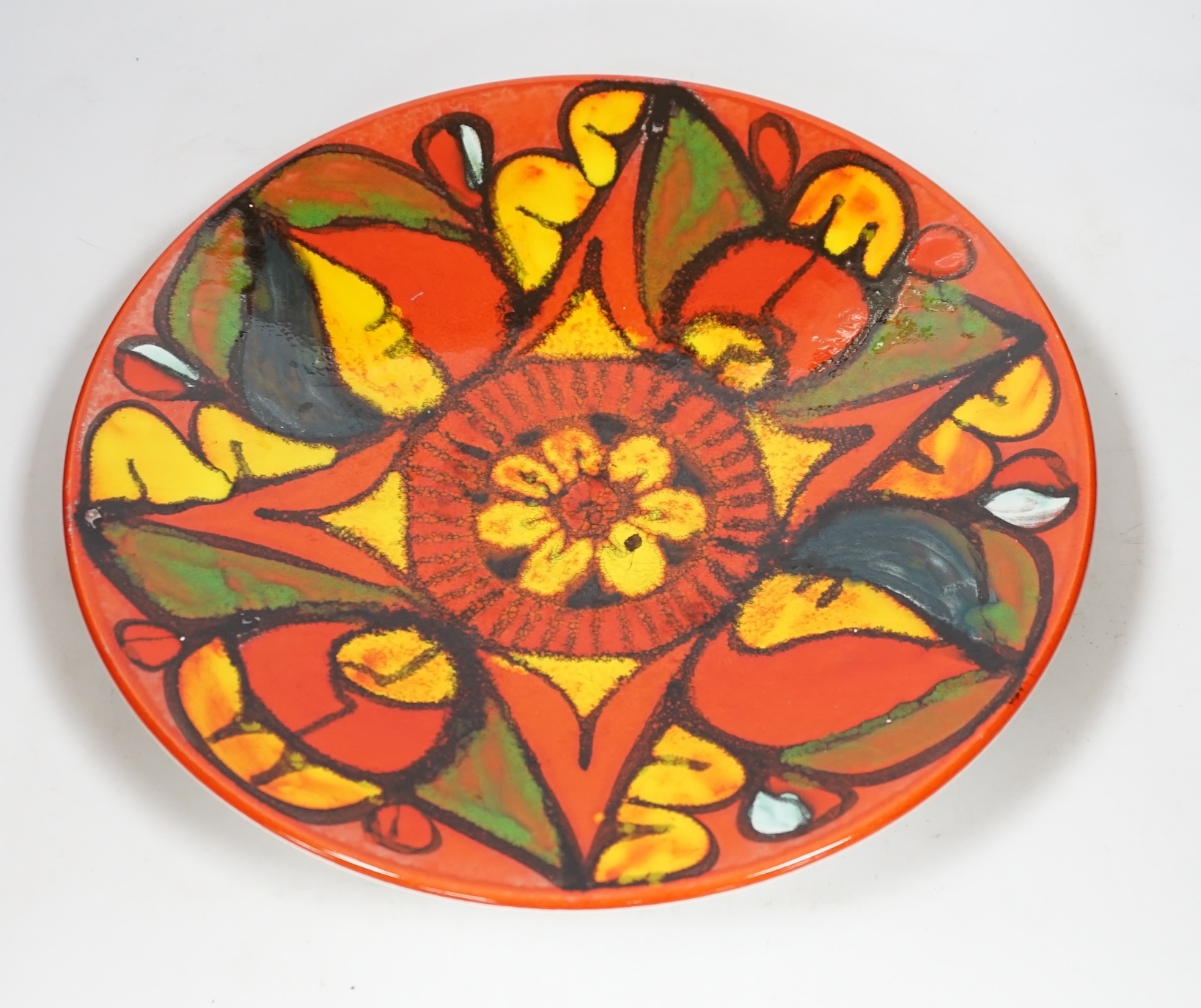 A large Poole Pottery Delphis charger, 41cm diameter